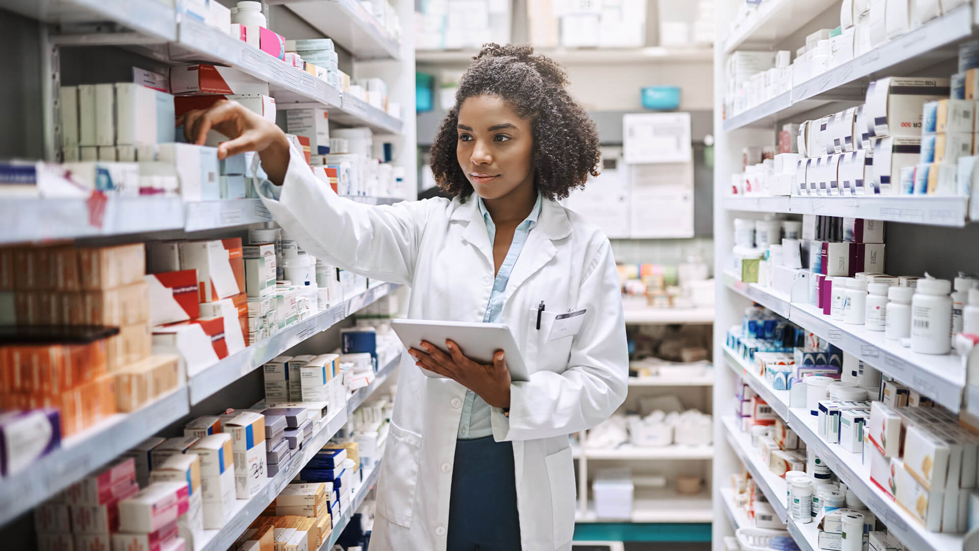 female pharmacist working in a pharmacy