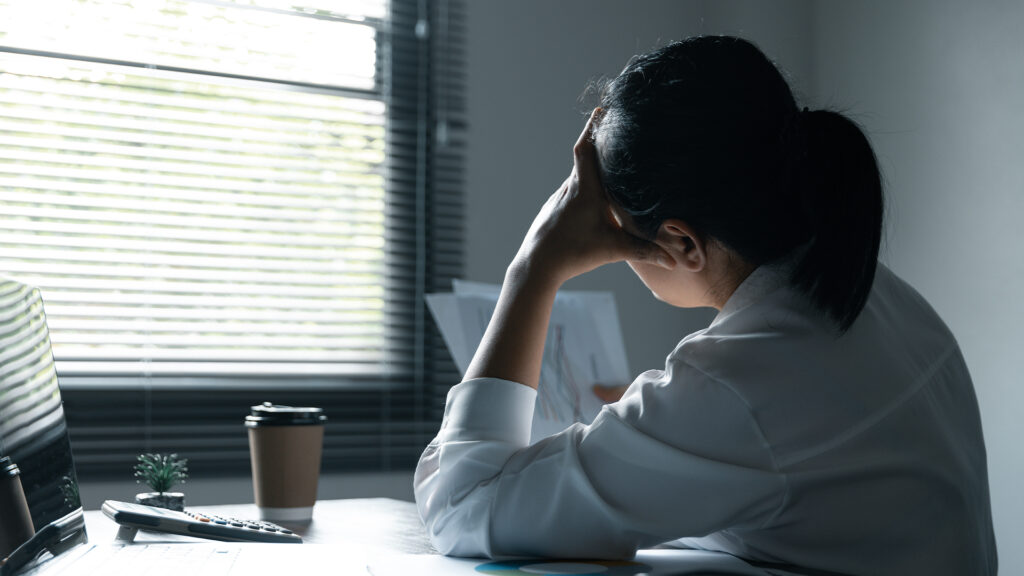 A woman battles depression and stress in her workplace
